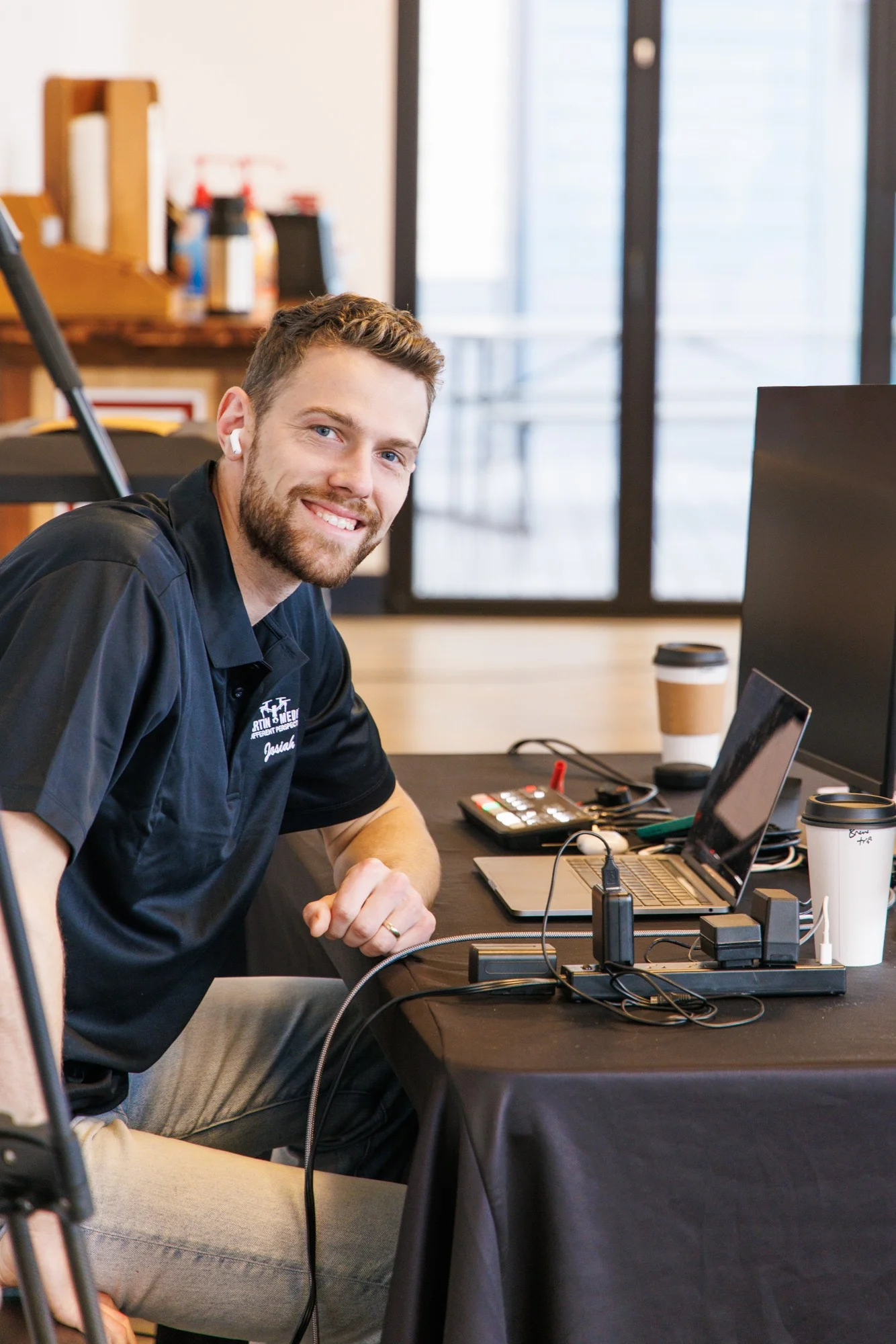 Josiah Martin directing live production desk with Martin Media gear