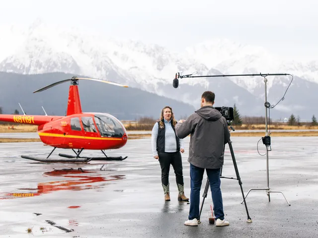 Seward helicopter tour flying over rugged Alaskan mountains